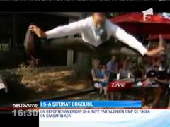 Un reporter american şi-a rupt pantalonii în timp ce făcea şpagat în aer