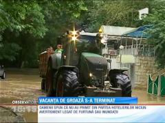 Au scăpat de furia apelor și s-au întors acasă!