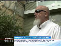 O casă construită în peşteră, scoasă la licitaţie