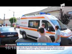 O familie din Zalău şi-a văzut acoperişul casei în flăcări