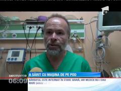 A sărit cu maşina de pe pod