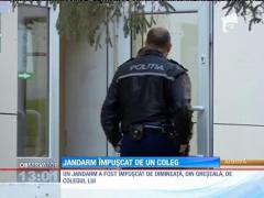 Jandarm împuşcat în picior de un coleg
