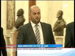 Parlamentarii și-au comandat insigne de aur