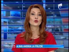 A găsit peste 10.000 de euro într-o borsetă şi a anunţat poliţia