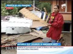 Cod roşu de inundaţii: Doi morţi, localităţi sub ape, sute de sinistraţi