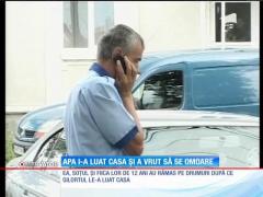 O femeie rămasă fără casă în urma inundaţiilor a vrut să se sinucidă