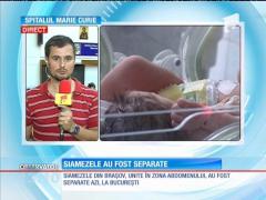 Siamezele din Braşov unite în zona abdomenului au fost separate