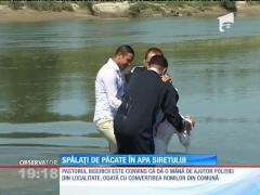 Spălați de păcate în apa Siretului
