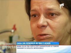 Familia care trăia într-o remorcă a primit în dar o casă