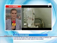 Fetiţă de un an arsă de fratele mai mare