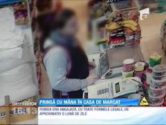 Vânzătoare filmată în timp ce fura din casa de marcat