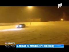 Parcarea unui supermarket, derdeluş pentru câţiva şoferi