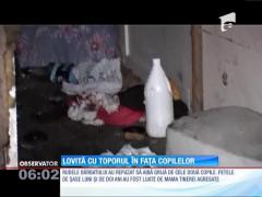 Mutilată cu un topor în fața copilelor sale