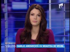 Familie amenințată cu moartea de vecini