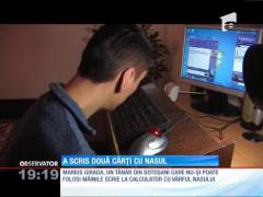 Un tânăr din Botoşani care nu-şi poate folosi membrele a scris două cărți cu nasul