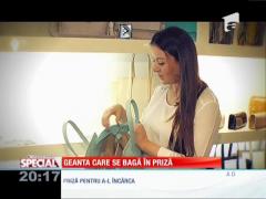 Un designer român a creat poşeta cu încărcător şi lanternă