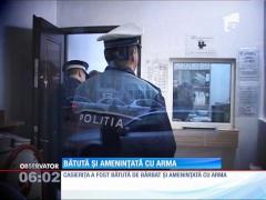 Angajata unei case de schimb valutar, bătută și amenințată cu arma