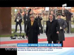 Germania și Grecia încearcă să se împace