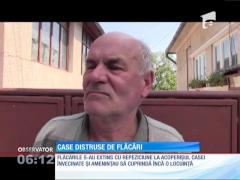 Două case au fost cuprinse de flăcări într-un cartier din Dej