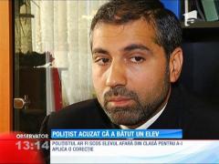 Poliţist acuzat că a bătut un elev