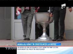 Un bebeluş a fost rănit de preot în timpul botezului