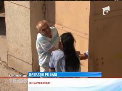 Medic urolog, prins în flagrant în timp ce primea mită