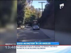 A mers cu mașina, cu spatele, pe un bulevard aglomerat din Los Angeles!