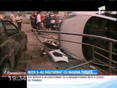 Doi hoți s-au răsturnat cu mașina furată