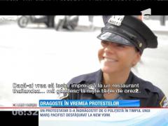 Săgeata lui Cupidon loveşte în cele mai neaşteptate momente! Un tânăr s-a îndrăgostit de o poliţistă la un protest