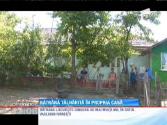 Bătrână tâlhărită de patru tineri