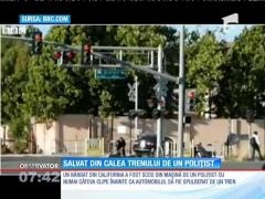Imagini dramatice surprinse în SUA! Un polițist l-a salvat în ultima clipă pe un șofer din calea unui tren