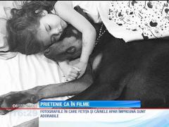 Prietenie ca în filme între o fetiţă şi un doberman