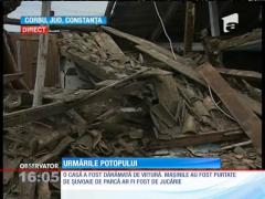 Urmările potopului care a lovit localitatea Corbu