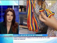 O femeie bolnavă de Parkinson îşi creşte fetele cu 39 de lei pe lună