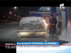 O femeie din Rusia şi-a incendiat accidental maşina chiar la o benzinări