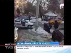 Om al străzii, bătut de poliţişti