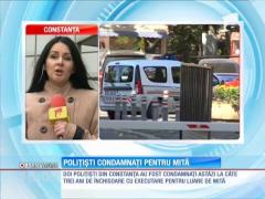 Polițiști condamnați la 3 ani de închisoare pentru luare de mită