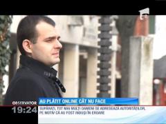 Tot mai mulţi clienţi ai unor magazine virtuale descoperă că preţul de pe site nu e şi cel retras din cont