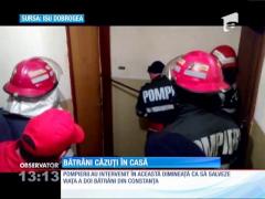 Bătrâni salvaţi de pompieri din propria casă