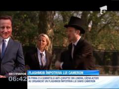 Flashmob împotriva lui David Cameron, chiar în prima zi a summitului anti-corupţie din Londra