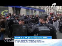 Proteste violente în Franţa. O maşină de poliţie a fost incendiată cu doi agenţi la bord