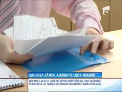 Românii care vor să aplice legea dării în plată, trecuţi pe lista neagră. Timp de patru ani, vor avea interdicţie la împrumuturi bancare