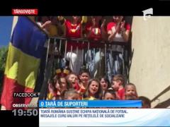 O ţară de suporteri! Un singur mesaj răzbate din piepturile lor: "Hai, România!"