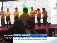 E scandal în China! Angajaţii unei bănci, bătuţi cu rigla pentru că nu şi-au îndeplinit obiectivele