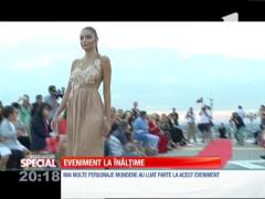 Special! Creatoarea unei colecții de rochii de seară și-a prezentat creațiile deasupra orașului, pe un heliport