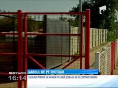 Gardul de pe trotuar