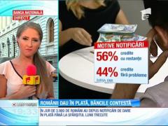 Românii dau în plată, băncile contestă