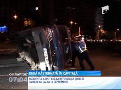 Dubă răsturnată, după impactul violent cu o altă maşină