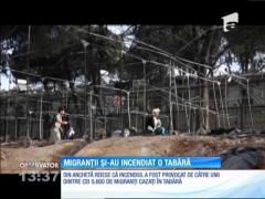 Migranții din insula Lesbos, din Grecia, și-au incendiat o tabără