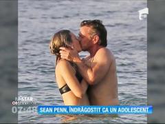 Sean Penn, ca un adolescent îndrăgostit lângă noua lui cucerire
